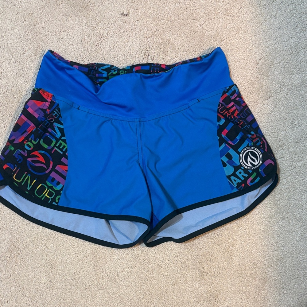 Ink & Burn Vibrant Blue Athletic Shorts with Graphic Design